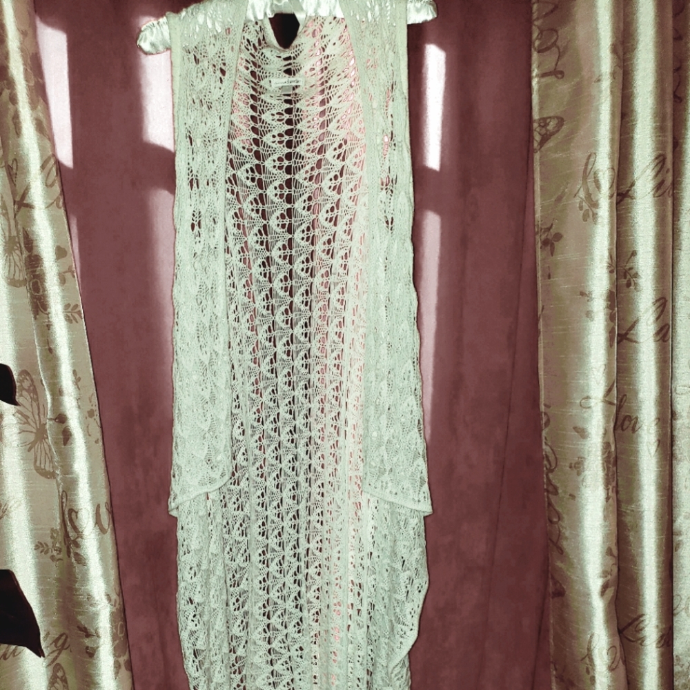 Knitted long cardigan by Charming Charlie. Size S